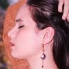 Boucles d’oreilles asymétriques Lunaria en acier inoxydable doré avec lune et zircon
